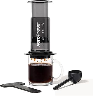 AeroPress Clear Black Coffee Press - 3‑in-1 brewing method combines French Press, espresso and rich coffee without grums or bitterns, small portable coffee maker for camping and travel, black
