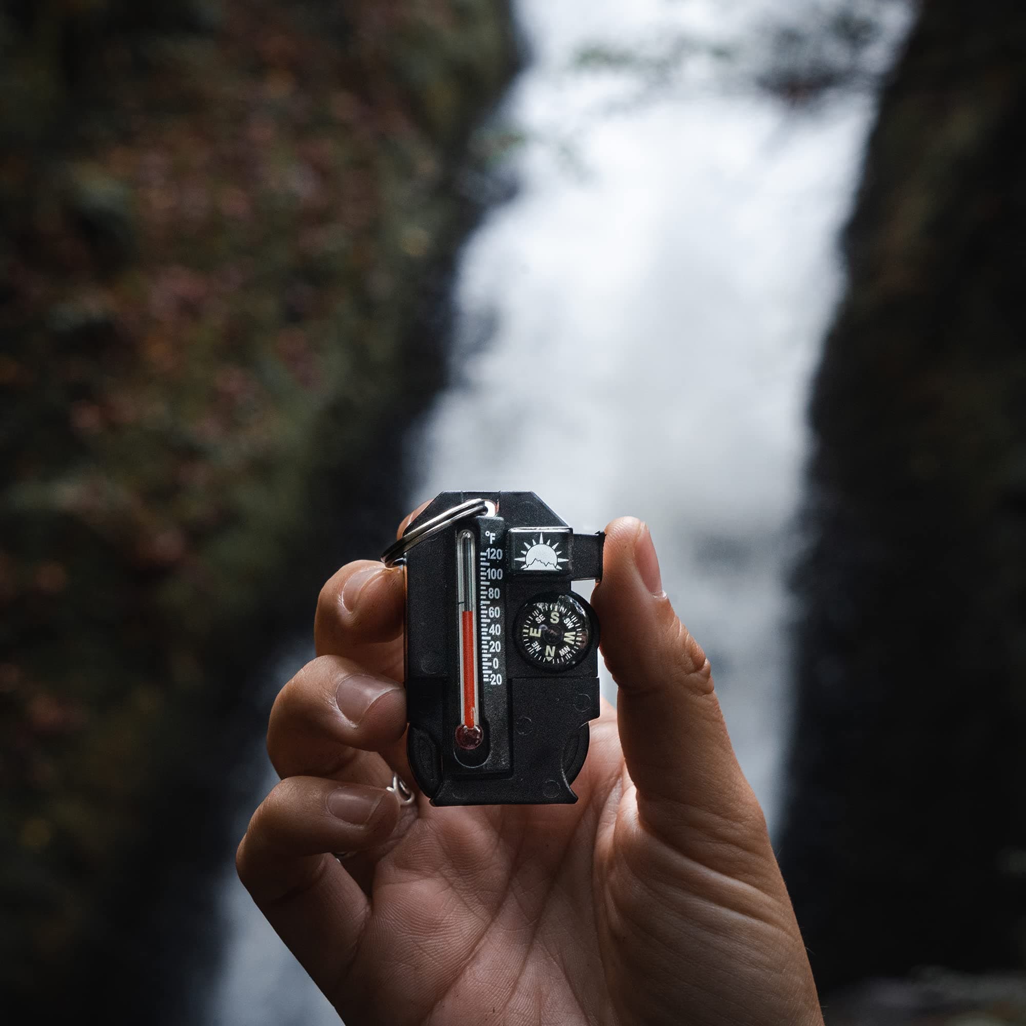 Sun Company Outsider - 4-in-1 Survival Multi-Tool | Compass, Thermometer, Whistle, and Fire Starter in a Compact Zipper Pull | Outdoor Gadget for Backpacking, Camping, or Survival Situations